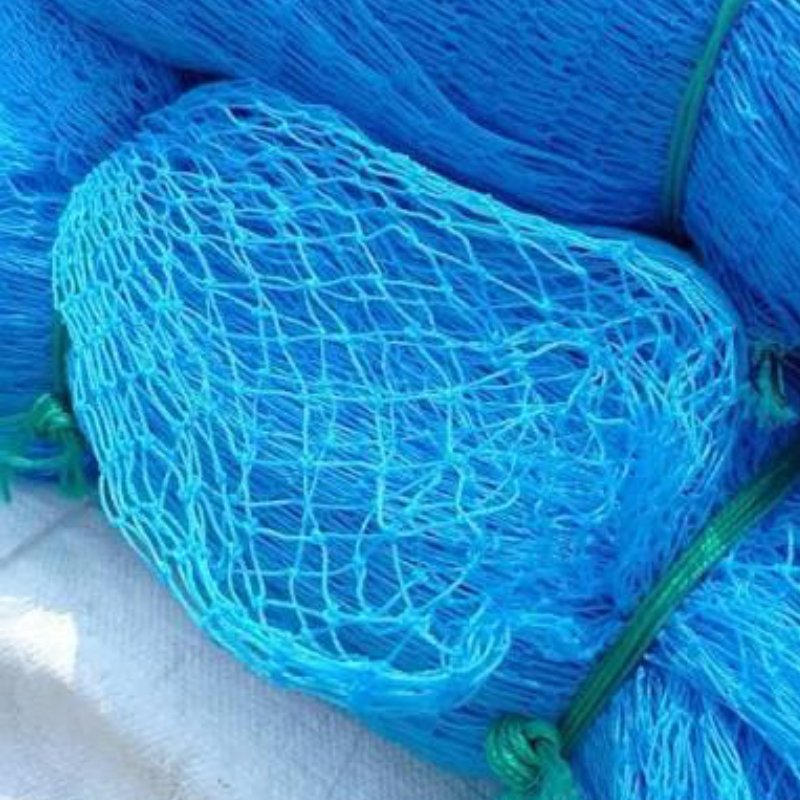 High-quality UV-stabilized agricultural net for crop protection by Krishna Plastic Gujarat.