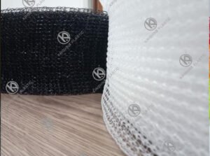 Dual-tone black and white nylon scrubber net for heavy-duty cleaning by Krishna Plastic.