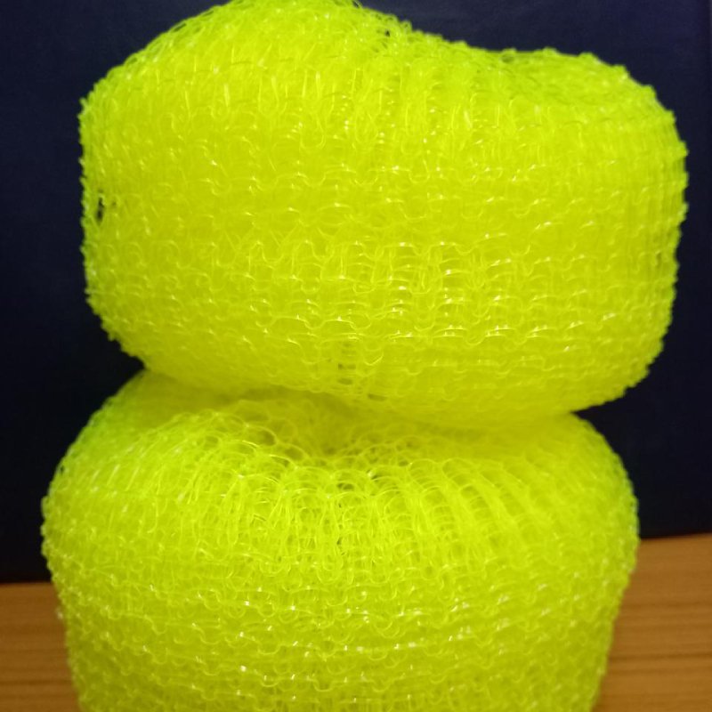 Durable nylon ball scrubber for gentle and effective utensil cleaning by Krishna Plastic.